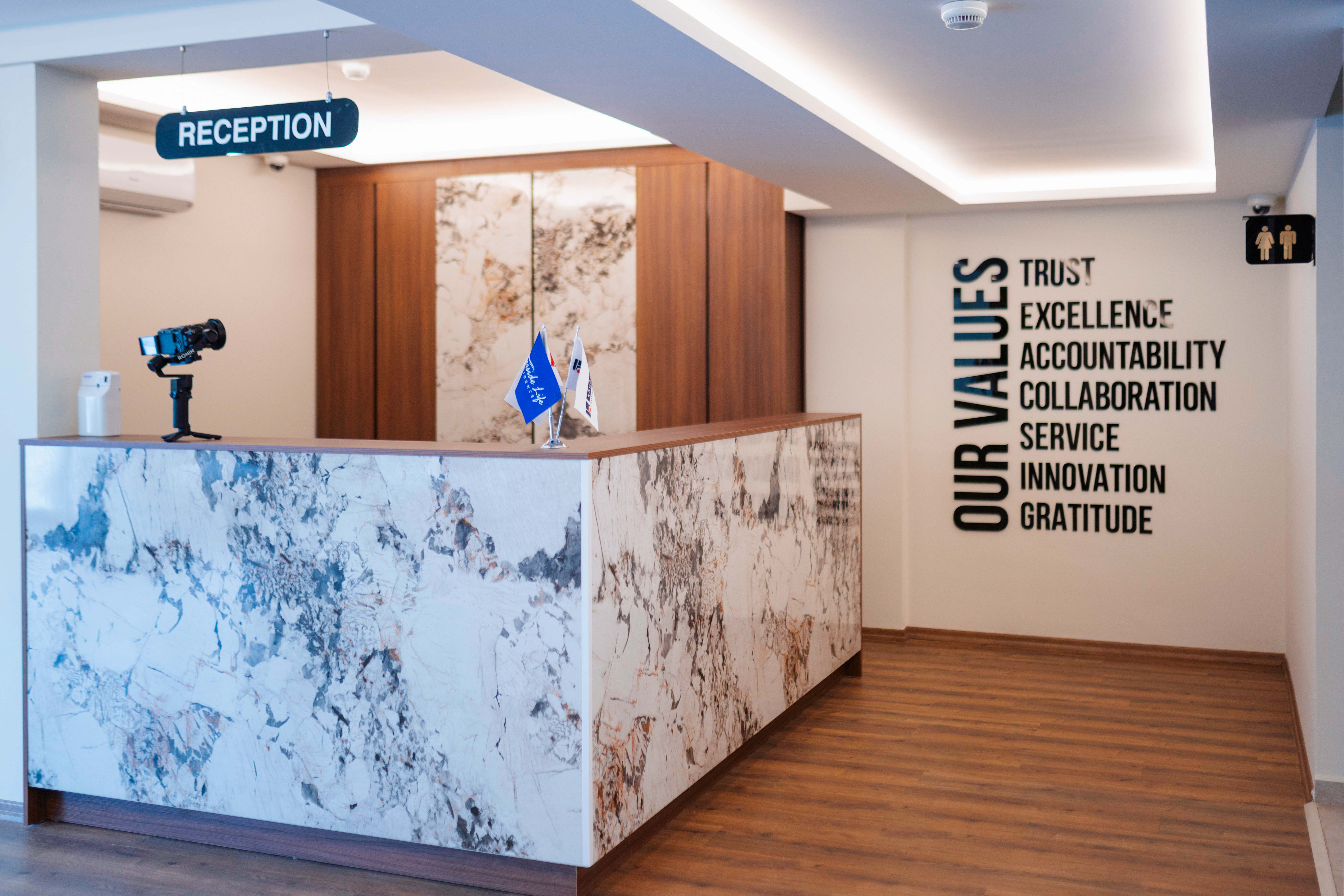 Business Hub Reception with Our Values wall